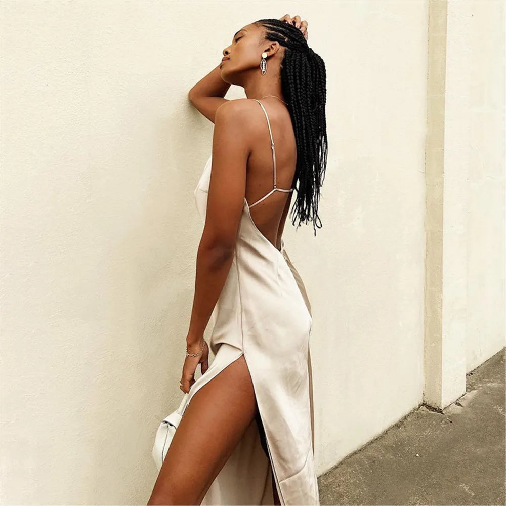 Satin maxi dress with a plunging neckline and slit