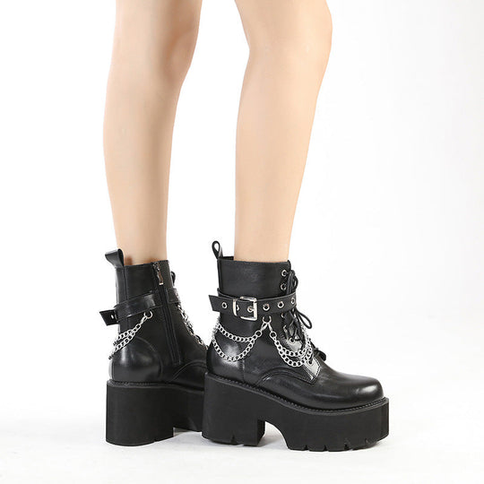 Black Martens-style high-heeled boots