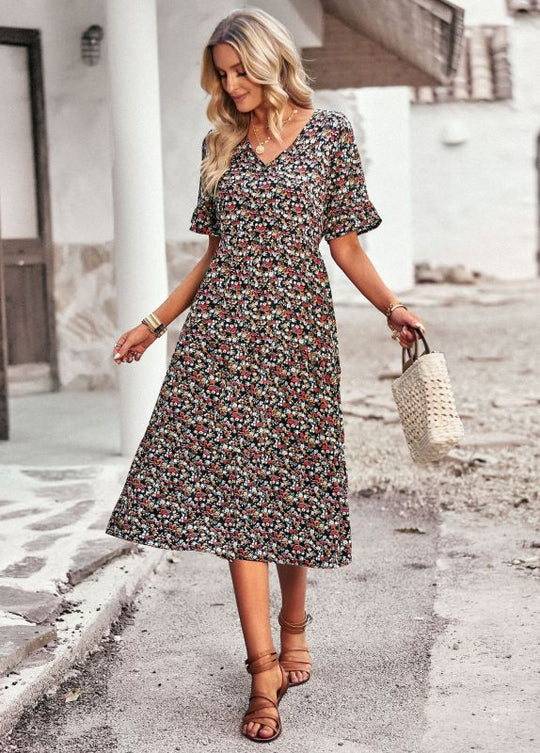 Elegant ladies midi dress with floral pattern