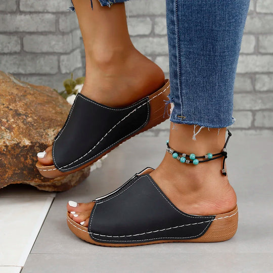 Leather orthopedic women's sandals on a platform