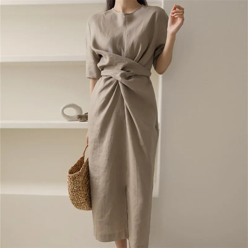 Women's midi linen dress with pleats at the waist