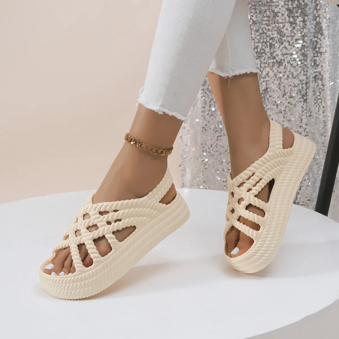 Women's sandals on a platform with braided straps