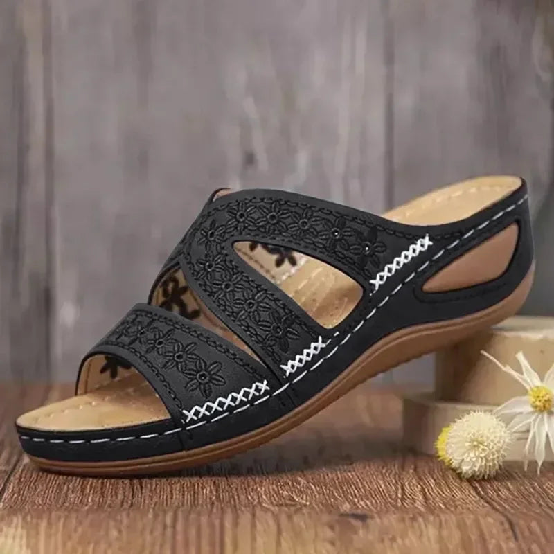 Orthopedic women's sandals with a shaped insole