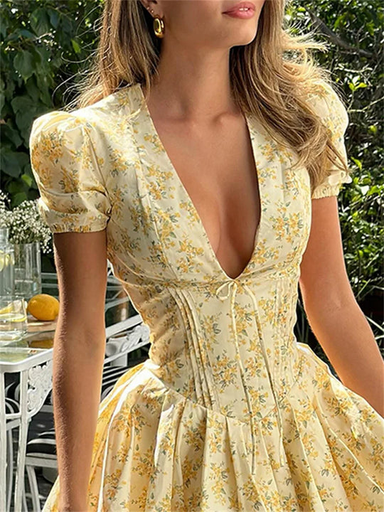 Dress with floral pattern and plunging back