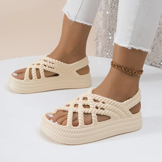 Women's sandals on a platform with braided straps