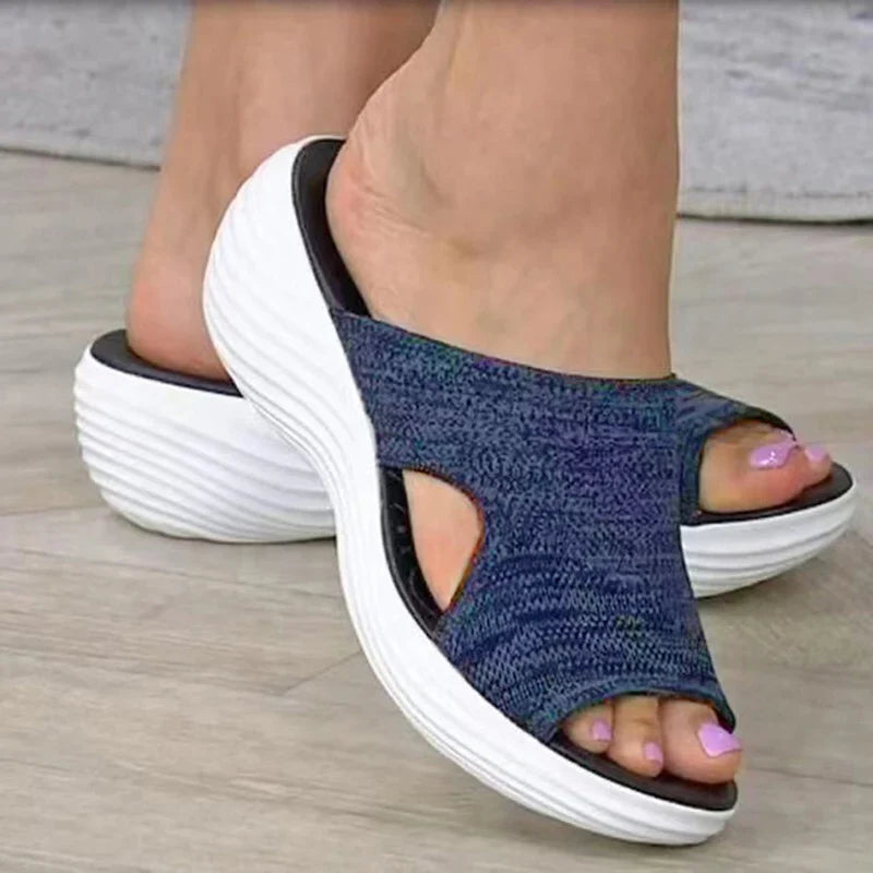 Women's orthopedic sandals on a platform made of elastic material