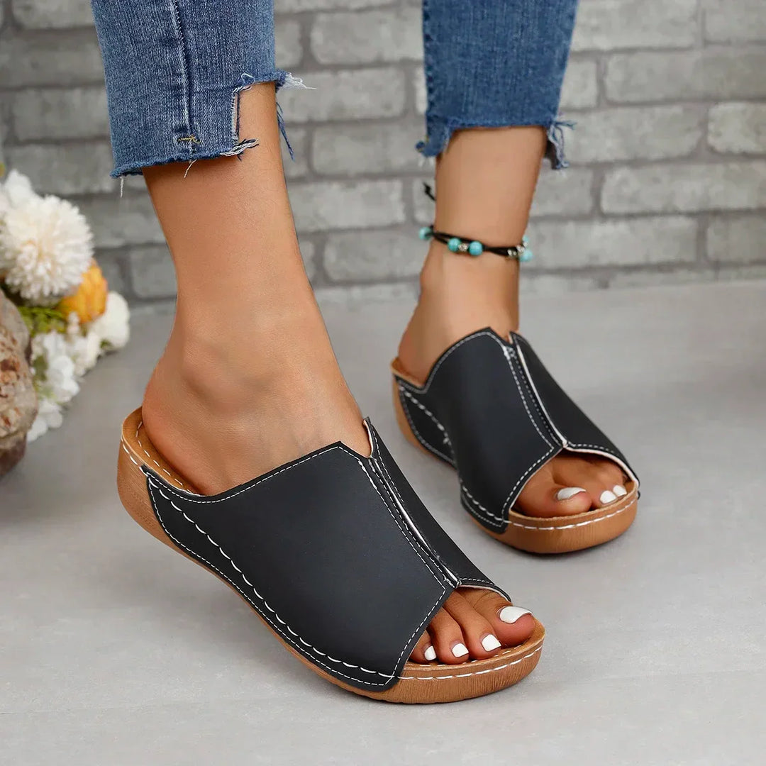Leather orthopedic women's sandals on a platform