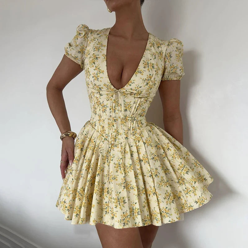 Dress with floral pattern and plunging back