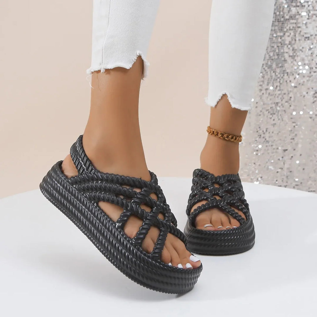 Women's sandals on a platform with braided straps