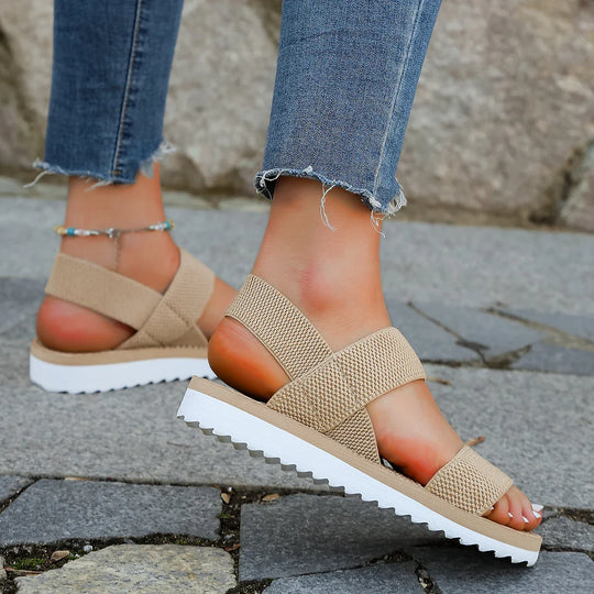 Women's sandals with a sporty sole and textile straps