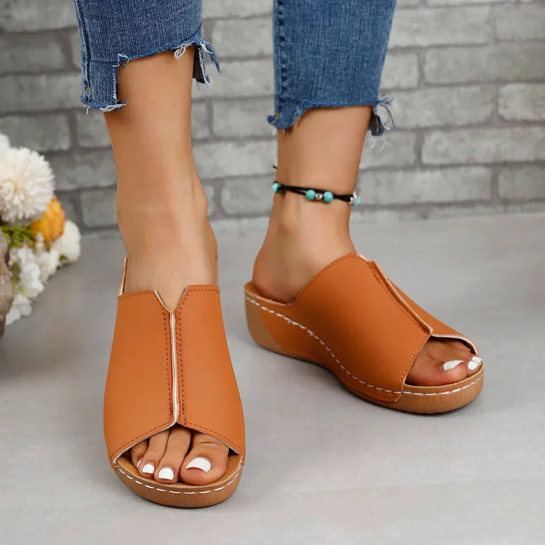 Leather orthopedic women's sandals on a platform