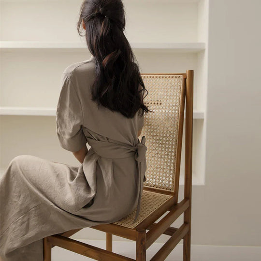 Women's midi linen dress with pleats at the waist