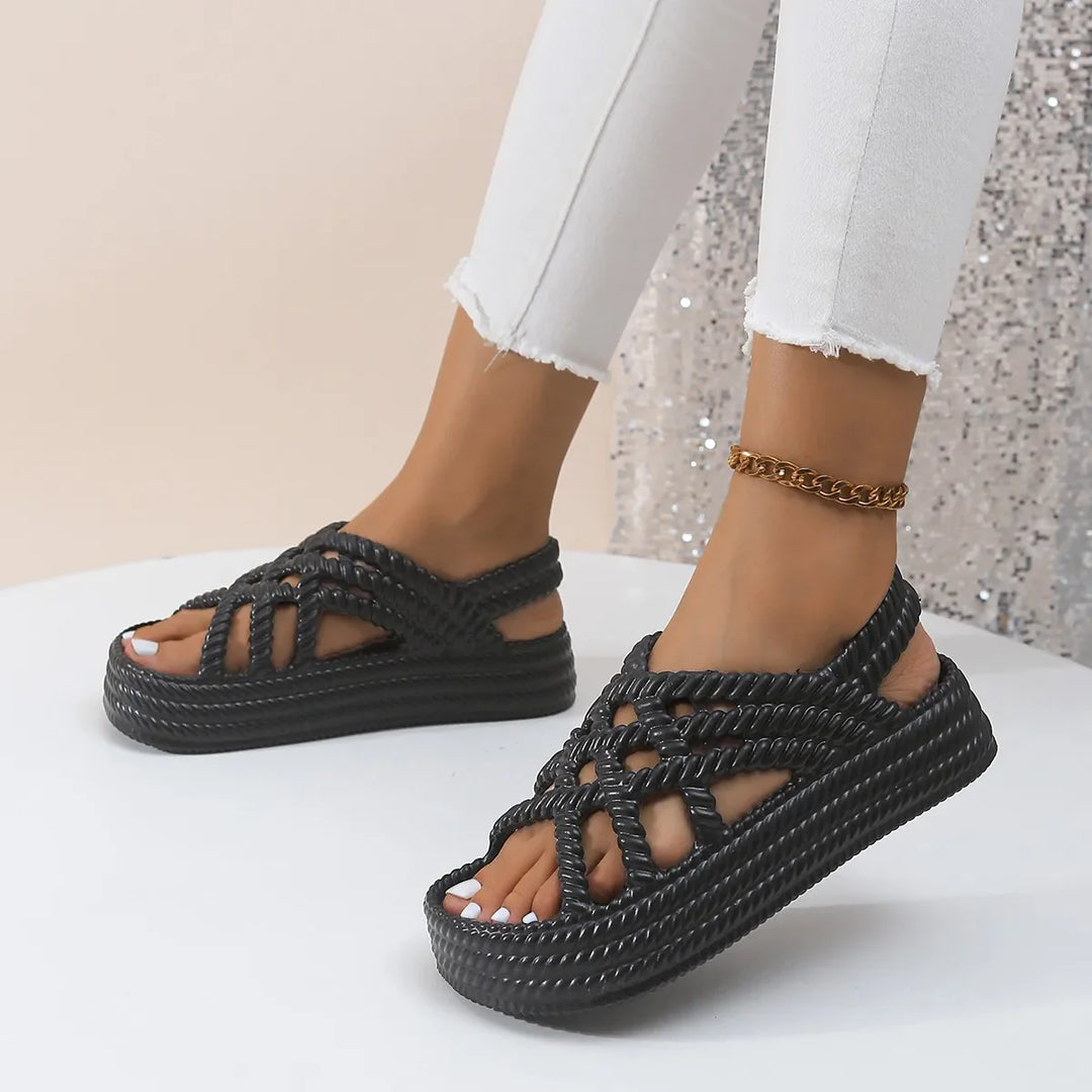 Women's sandals on a platform with braided straps
