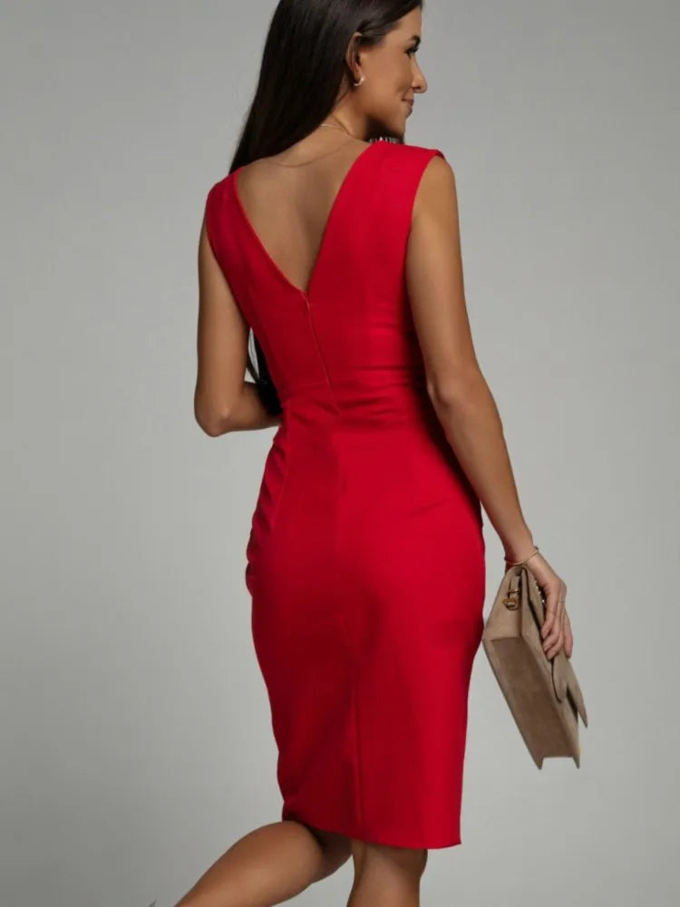 Elegant cocktail dress with pleats and a slit
