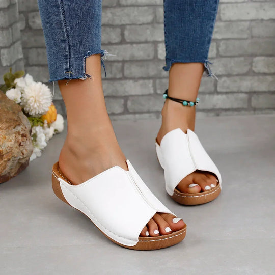 Leather orthopedic women's sandals on a platform