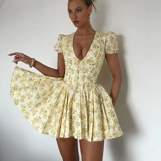 Dress with floral pattern and plunging back
