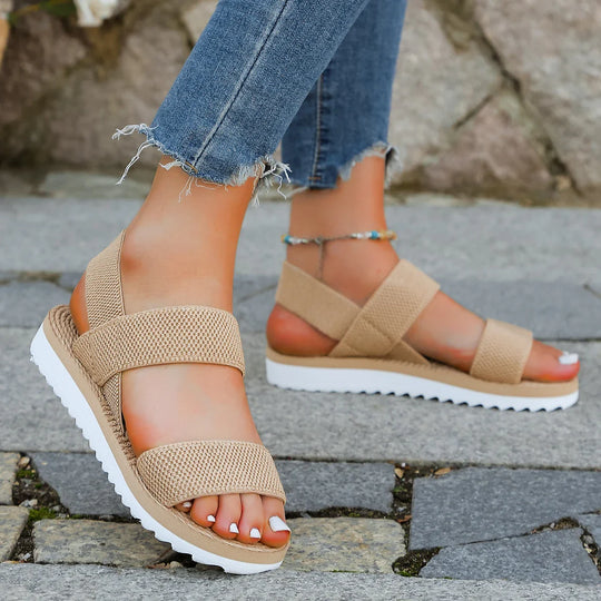 Women's sandals with a sporty sole and textile straps