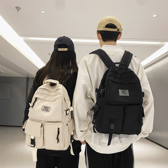Universal unisex backpack with pockets and buckles