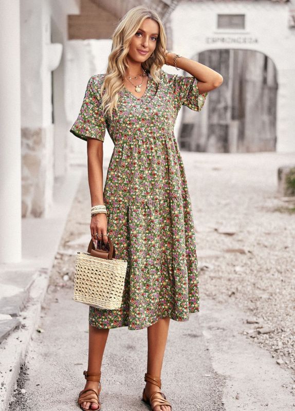 Elegant ladies midi dress with floral pattern