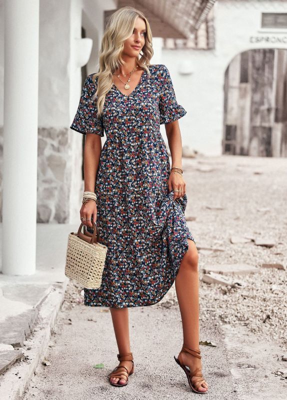 Elegant ladies midi dress with floral pattern
