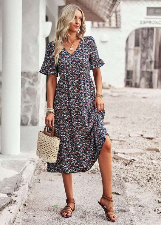 Elegant ladies midi dress with floral pattern