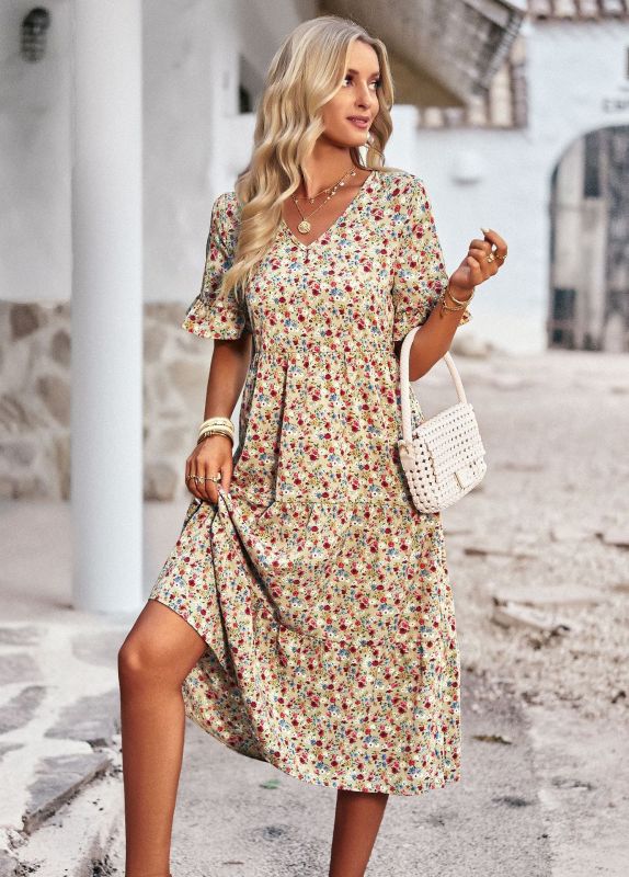 Elegant ladies midi dress with floral pattern